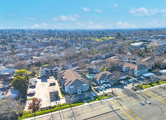 A suburban area with houses and roads.