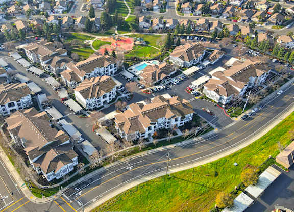 A suburban neighborhood with houses and streets.