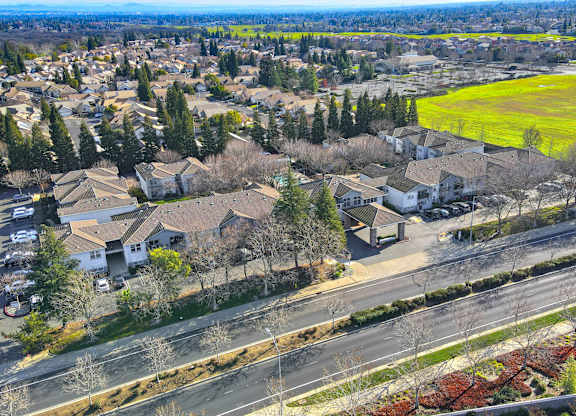A suburban neighborhood with houses and streets.
