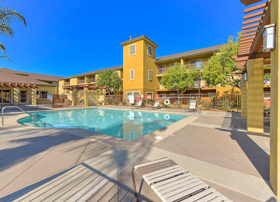 Poolside Relaxation Area at River Run Apartments, Corona, 92878