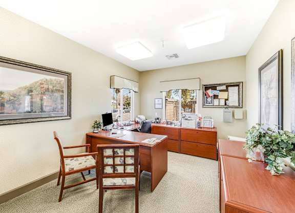 A room with a desk and a chair at Yorba Linda Apartments, Yorba Linda