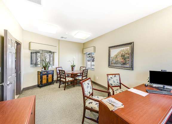 A room with a desk, chairs, and a computer at Yorba Linda Apartments, California, 92886