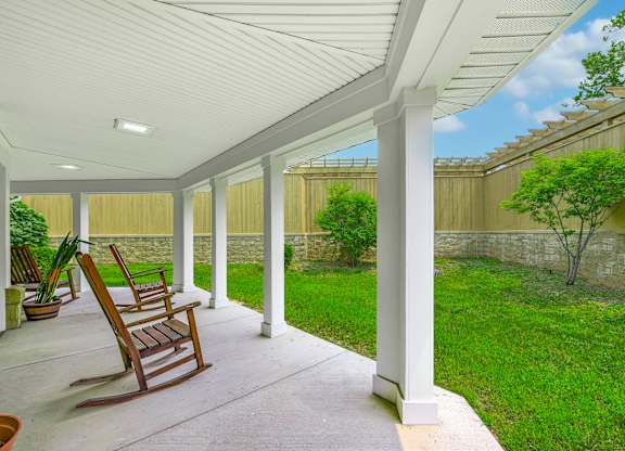 Porch with chair at Cameron Court, Detroit, 48211