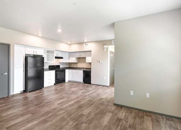Open concept kitchen and living area at Anton Arcade Apartments, Sacramento, CA