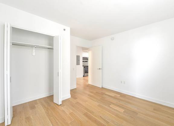 Room with a White Door at 38 6th Ave Apartments, New York, 11238