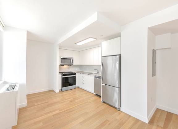 Kitchen with Wooden Floors at 38 6th Ave Apartments, Brooklyn, NY, 11238