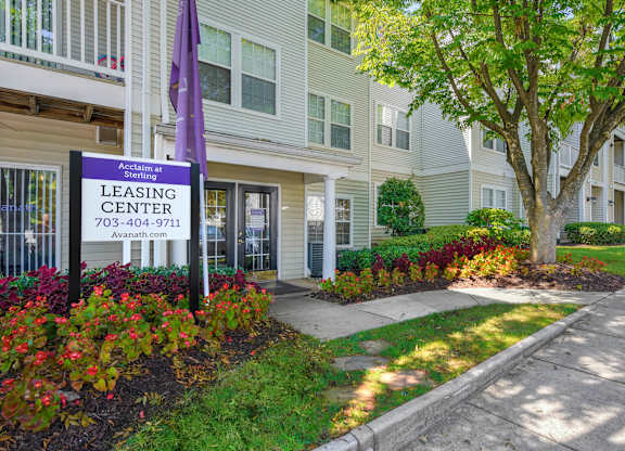 A leasing center sign in front of a building at Acclaim at Sterling, Sterling, VA, 20164