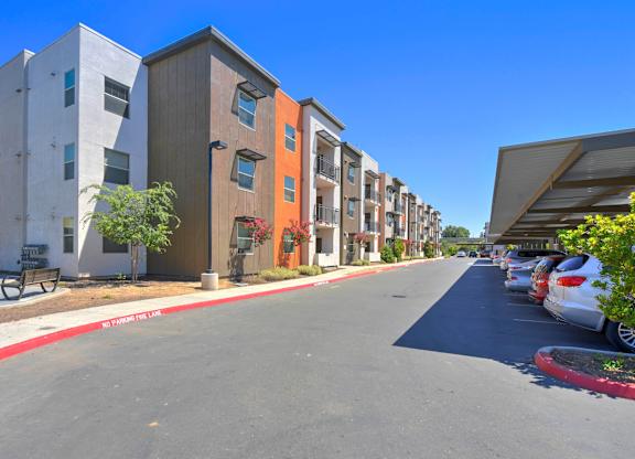 Modern townhomes with parking and fire lane at Anton Arcade Apartments, Sacramento, California