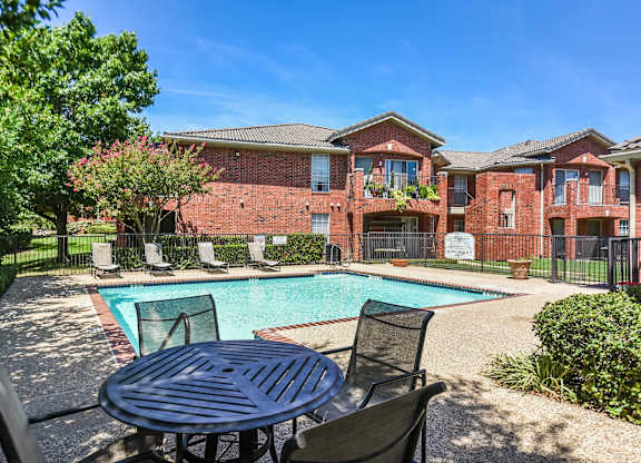 Pool With Relaxing Chairs at Cooper's Crossing, Irving, Texas