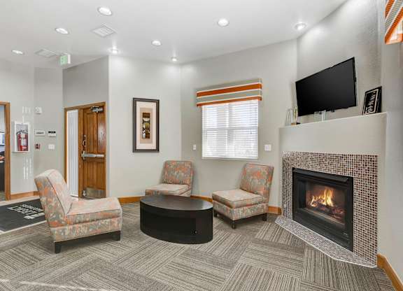Community Room with Fireplace at Fox Crossing Apartments, Denver, CO, 80231