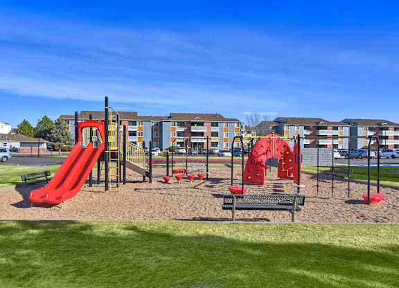 Playground with Red Slide at Fox Crossing Apartments, Denver, 80231