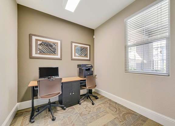 Business center with computer workstation and printer at Lincoln Creek Apartments, Dixon, California