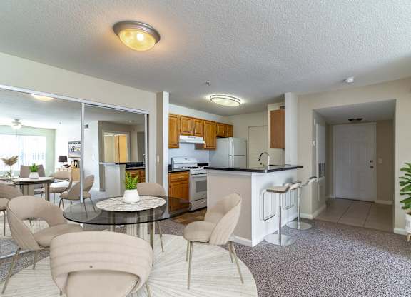 Dining And Kitchen View at Retreat at Valencia Apartment Homes, Orlando, FL