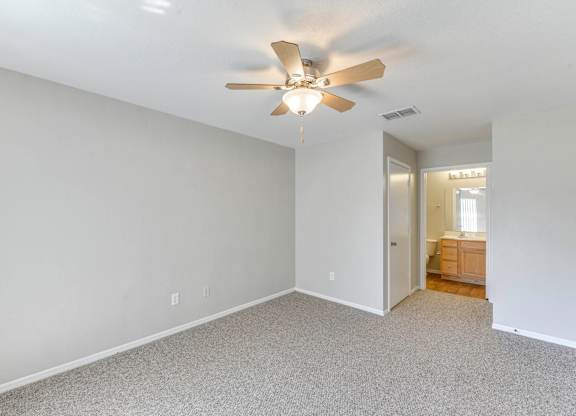 Room with ceiling fan at Saxon Trace, Orange City, FL