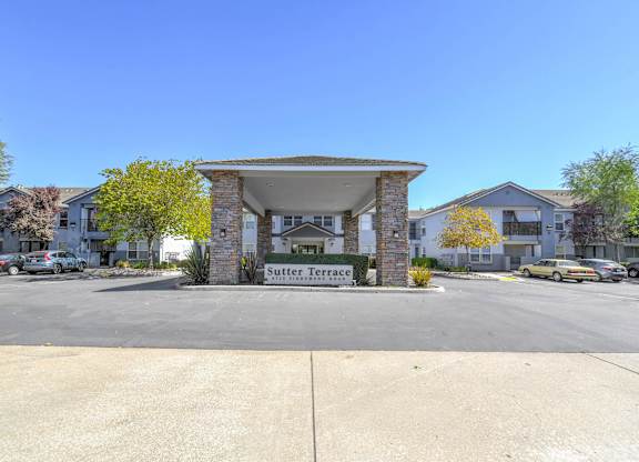 The entrance to Sutter Terrace with a clear blue sky above.