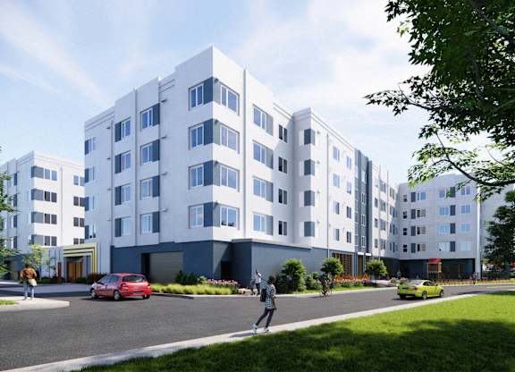 A modern apartment building with a red car parked in front at Rivo Apartments, Sacramento, CA, 95815