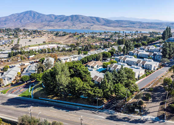 A small town with a mountain in the background.