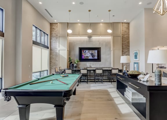 pool table in clubhouse at the estates apartments