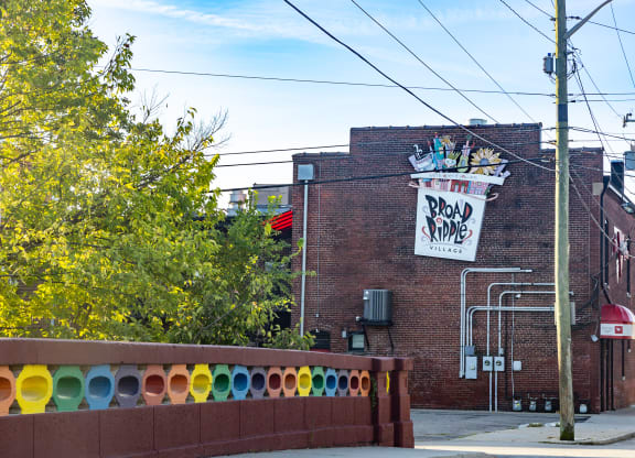 a brick building with a sign on the side of it