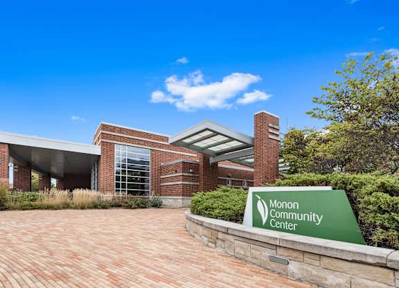 the front of a building with a sign for the morgan community center