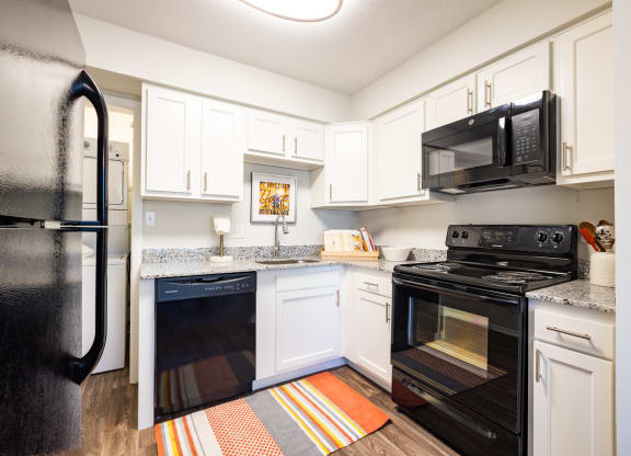 Fully Equipped Kitchen Includes Frost-Free Refrigerator, Electric Range, & Dishwasher at Gramercy, Carmel, 46032