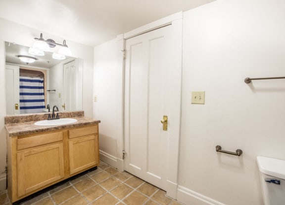 Bathroom with Cupboard under basin at Lockerbie Court on Mass Ave, Indianapolis, IN
