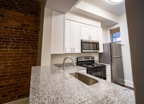 Granite Countertop Kitchen at Lockerbie Court on Mass Ave, Indianapolis, Indiana