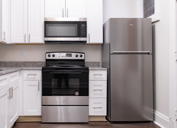 Spacious Kitchen With Pantry Cabinet at Lockerbie Court on Mass Ave, Indianapolis, IN, 46204