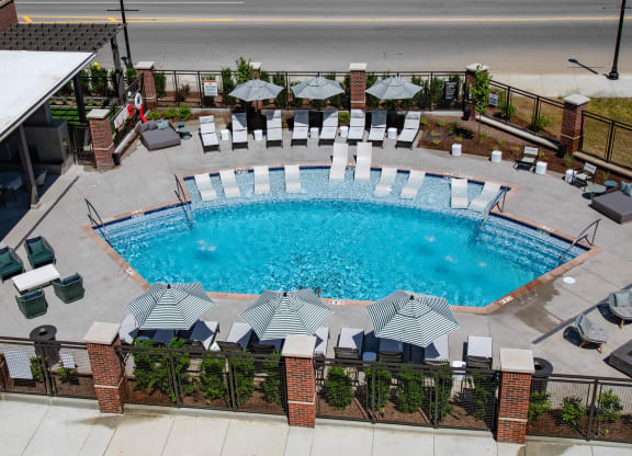 a view of the pool from above at the resort