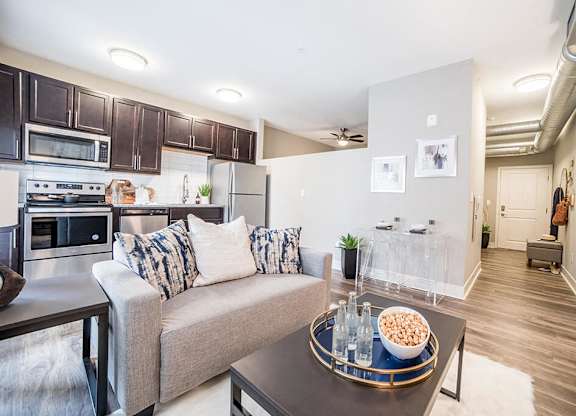 Living Room With Kitchen View at The Foundry, South Bend, 46617