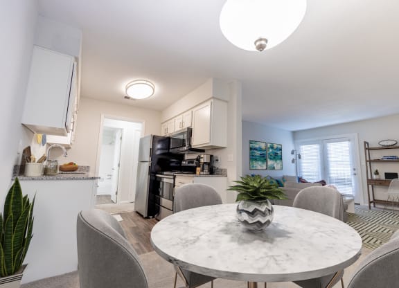 Dining Area With Kitchen View at Gramercy, Carmel, Indiana