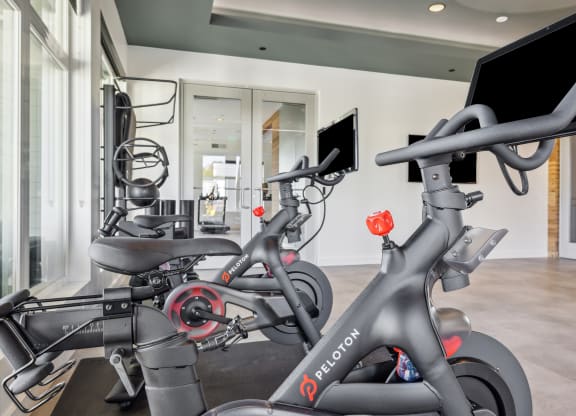 two exercise bikes in the gym at the belgard apartments at 38° NORTH, California 