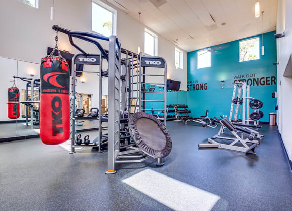 Gym with strength equipment at BELLA VISTA AT HILLTOP, Richmond, 94806