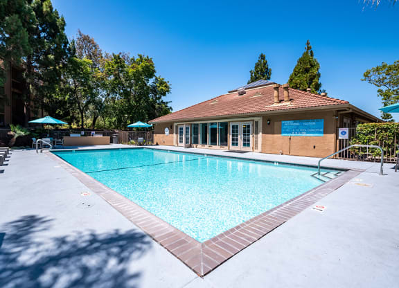 Exterior View of Bella Vista at Hilltop Apartments Building With View of Pool at BELLA VISTA AT HILLTOP, California, 94806