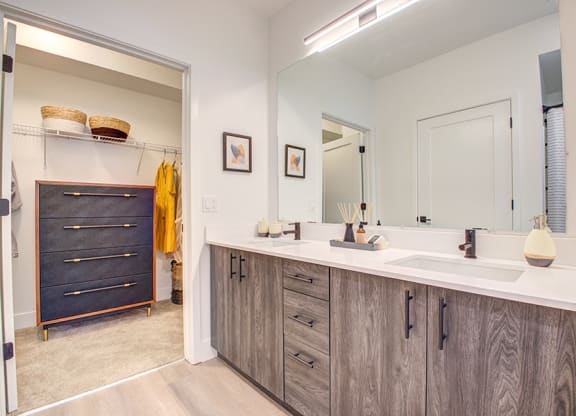 a bathroom with a large mirror and double sinks at 38° NORTH, Santa Rosa California 