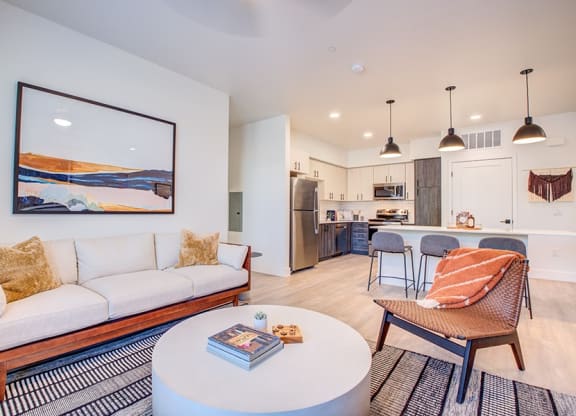 a living room with a white couch and a coffee table at 38° NORTH, Santa Rosa, 95404