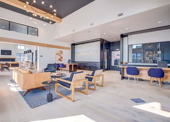 a living room filled with furniture and a large window at 38° NORTH, California