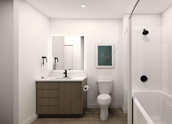 A bathroom with a toilet, sink, and bathtub. at 38° NORTH, Santa Rosa, 95404