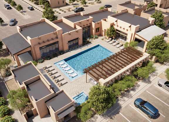 A modern building with a pool in the middle of it.