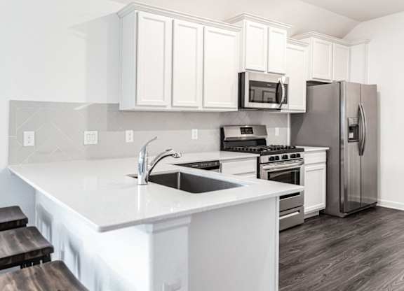 Homes in Humble TX for Rent - Edgewater at the Lagoon - Modern Kitchen with Stainless Steel Appliances