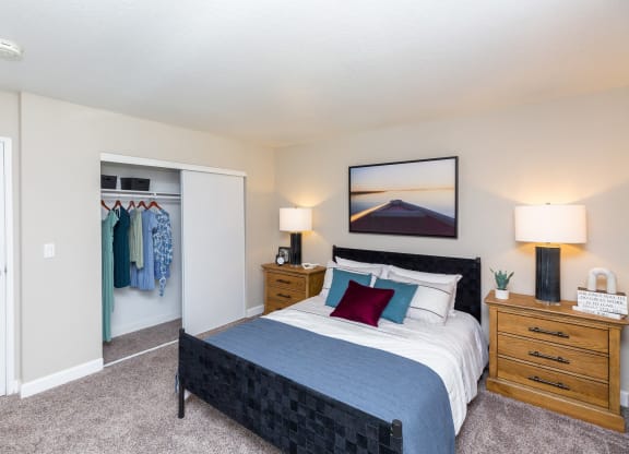 1-BR Apartments In Moreno Valley, CA - Sorelle Apartments - Spacious Bedroom With Plush Carpet Flooring And Closet With Sliding Door.