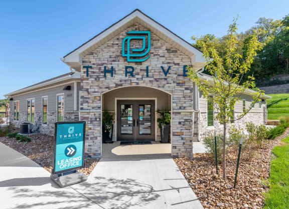 a building with a sign in front of it