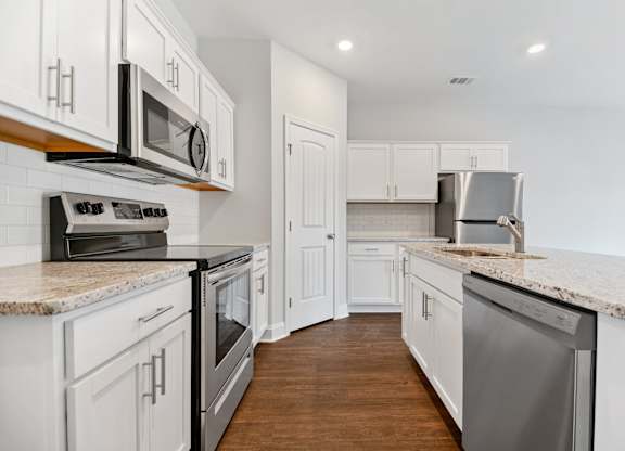 Cottonvale Towns in Savannah, GA photo of kitchen with stainless steel appliances