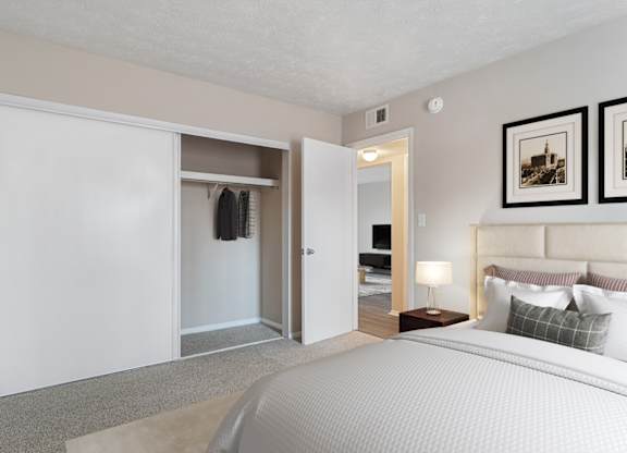 Bedroom with large sliding-door closet at Mableton Ridge Apartments in Mableton, GA, near Douglasville