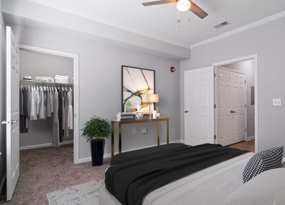 The Asher at Sugarloaf apartments in Lawrenceville Georgia photo of bedroom with ceiling fan