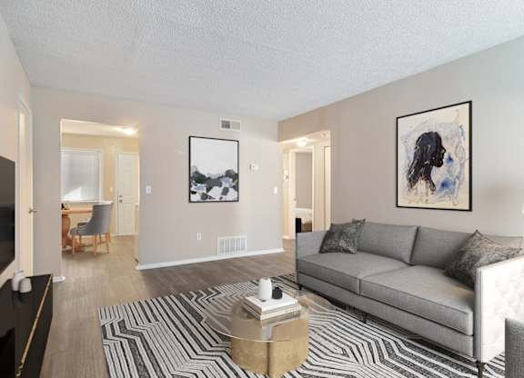 Spacious living room with large window in a pet-friendly apartment at Mableton Ridge Apartments in Mableton, GA, near Douglasville.