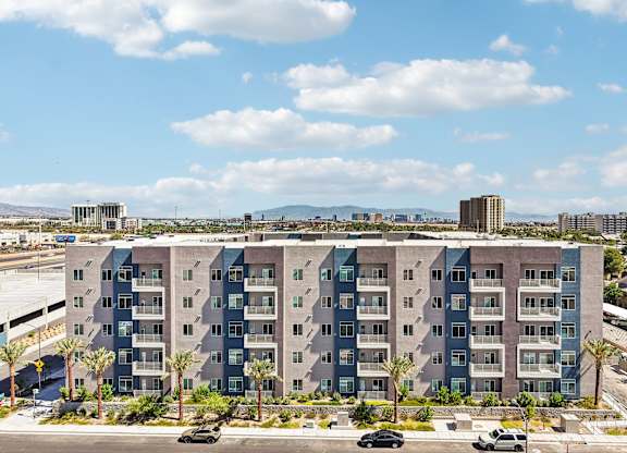 A large building with a lot of windows and balconies.