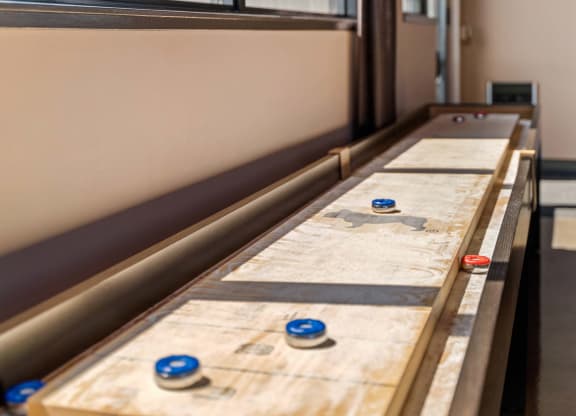 a row of pins on a table in a room
