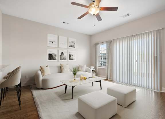 Omnia at Richmond Hill Townhomes in Georgia photo of living room with hardwood floors and ceiling fan