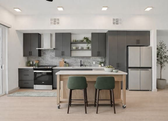 A modern kitchen with a table and chairs.